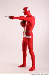 JOEL_ADAMSON CHRISTMAS HERO WITH GUN